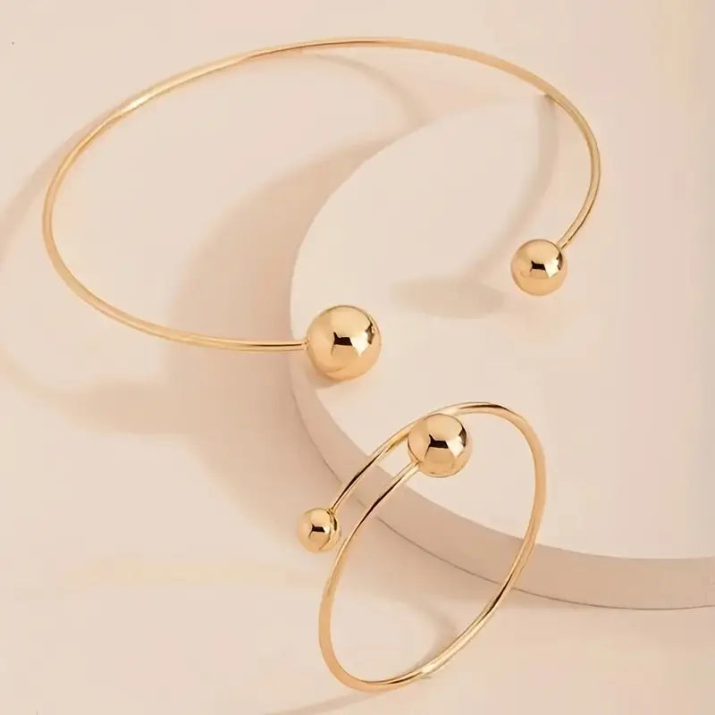 Conjunto de pulseras Glow™ Gold de Rose & Oliver, pulseras elegantes de metal dorado con detalles brillantes.