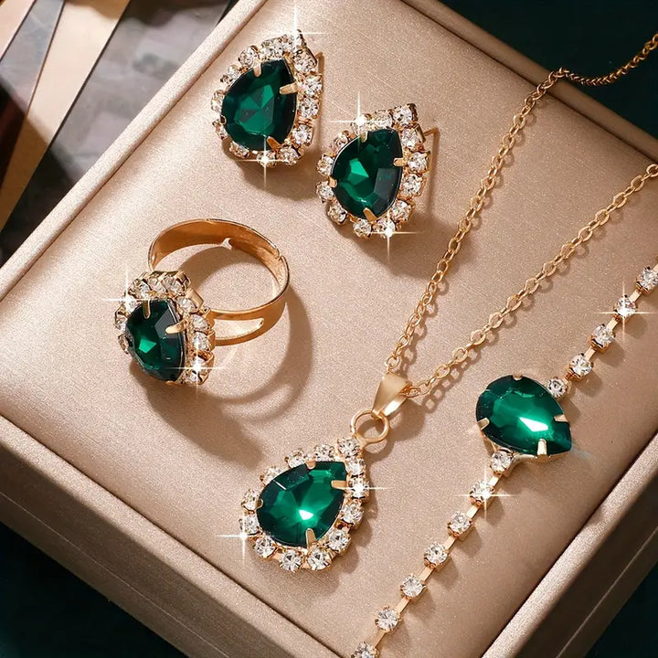 Conjunto de joyas Elisandre Vermont en oro de la marca Rose & Oliver, que incluye collar y aretes elegantes y sofisticados.
